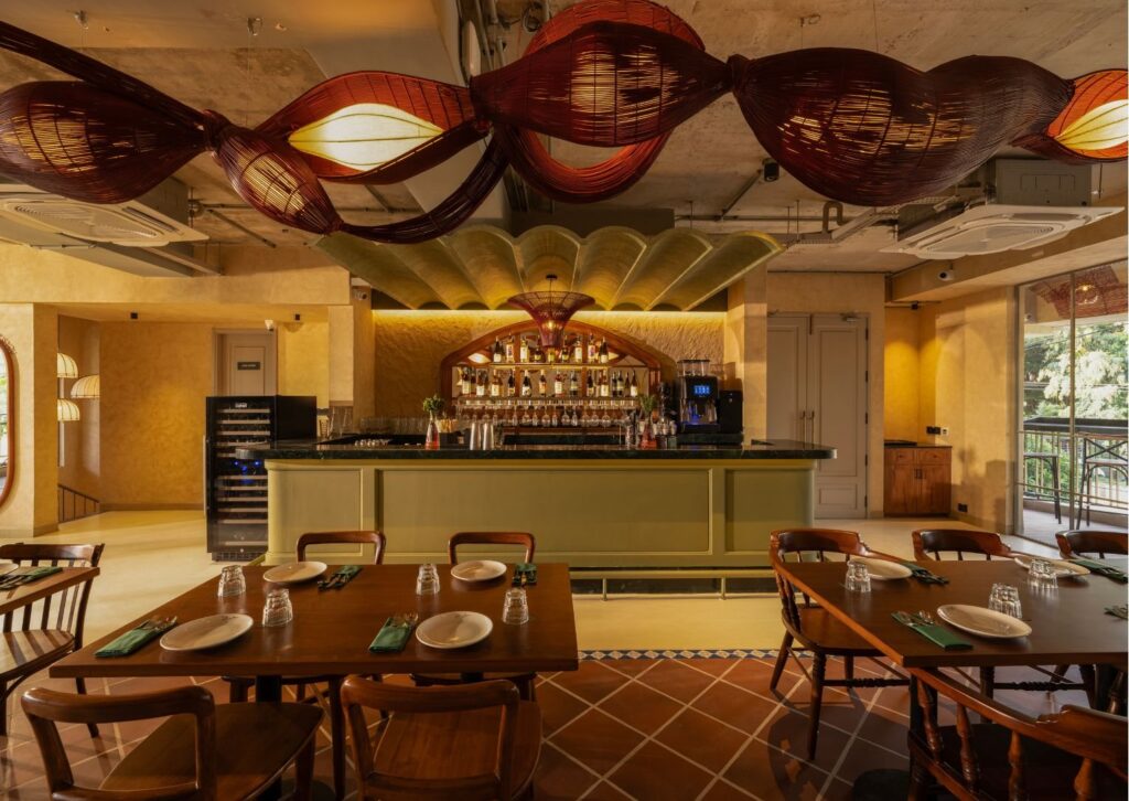 The bar counter under the painted ceiling