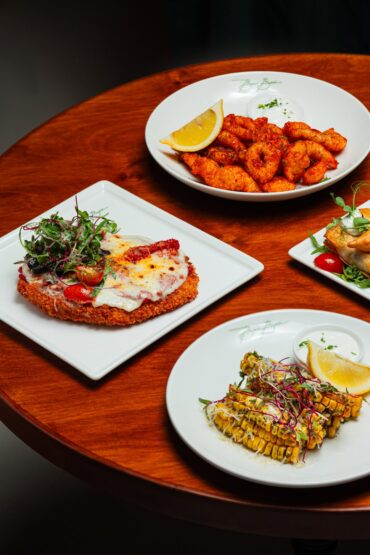 Fritto misto, pollo parmigiana and corn ribs to share