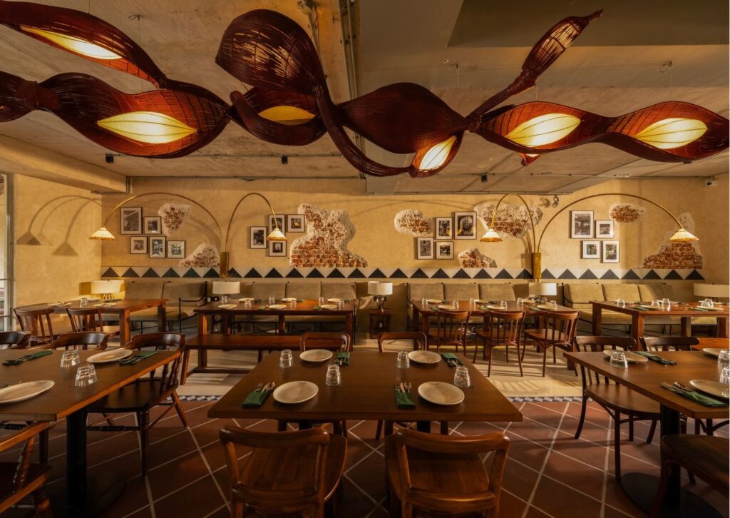 The dining room beneath its painted ceiling