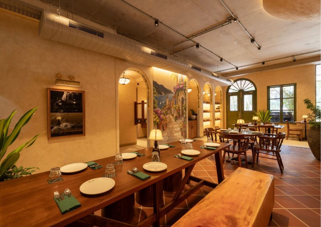 A long communal table laid for service