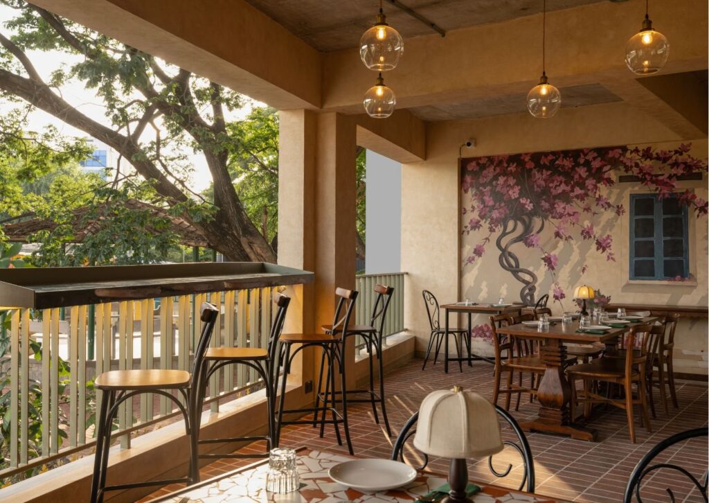 Terrace seating surrounded by greenery