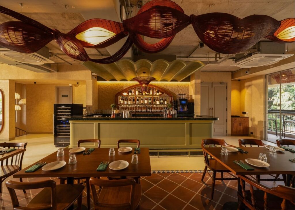 The bar counter under the painted ceiling