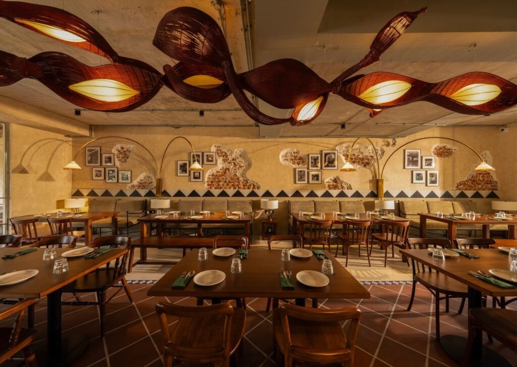 The dining room beneath its painted ceiling