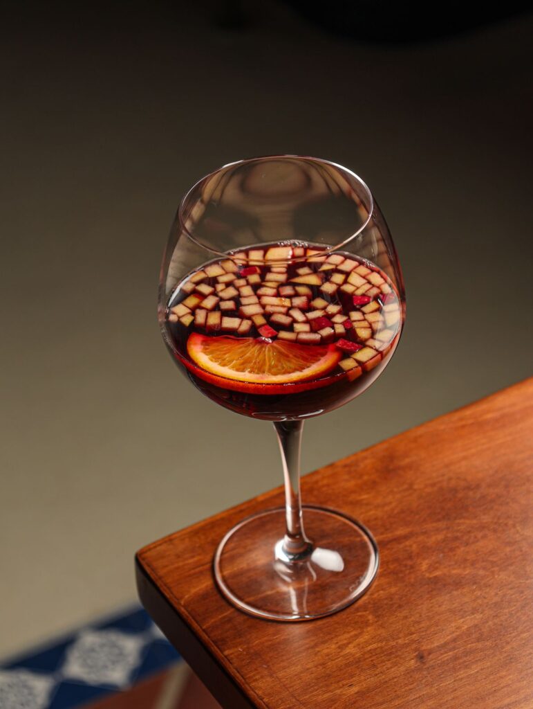 Sangria with orange and diced fruit
