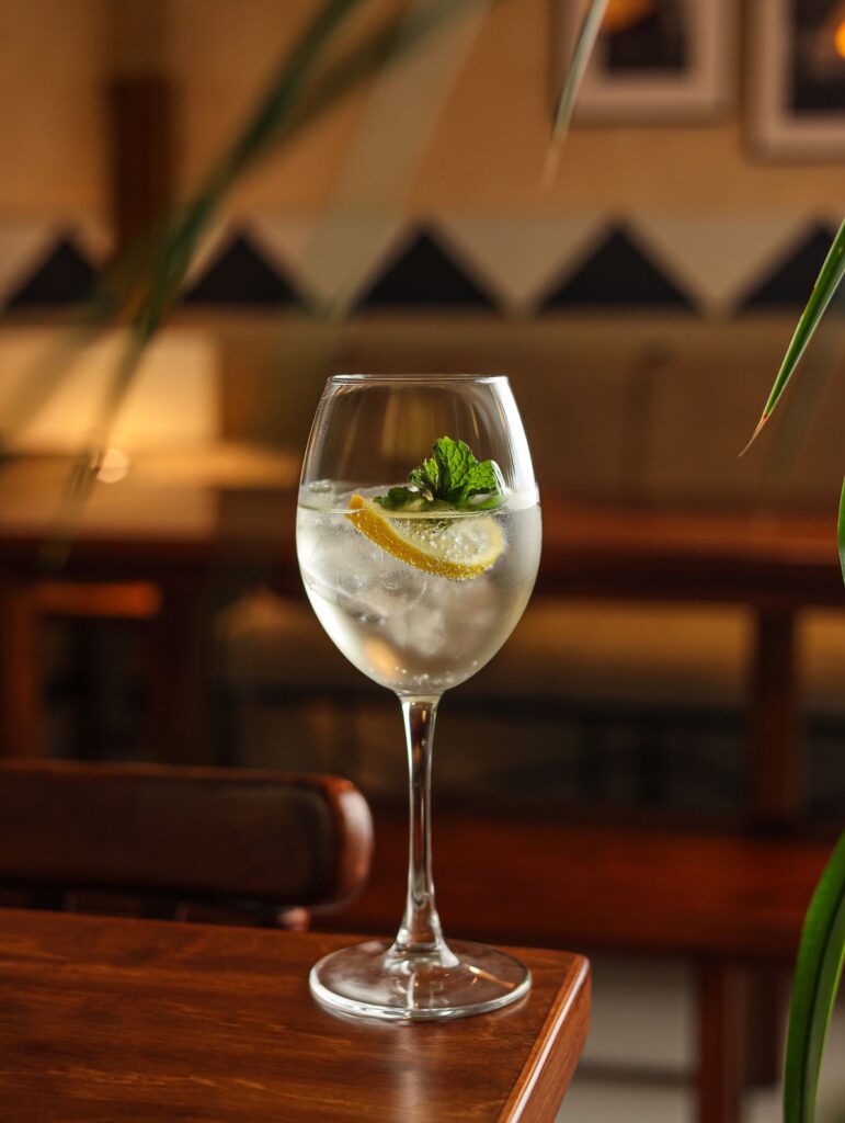 A white wine spritz with lemon and mint